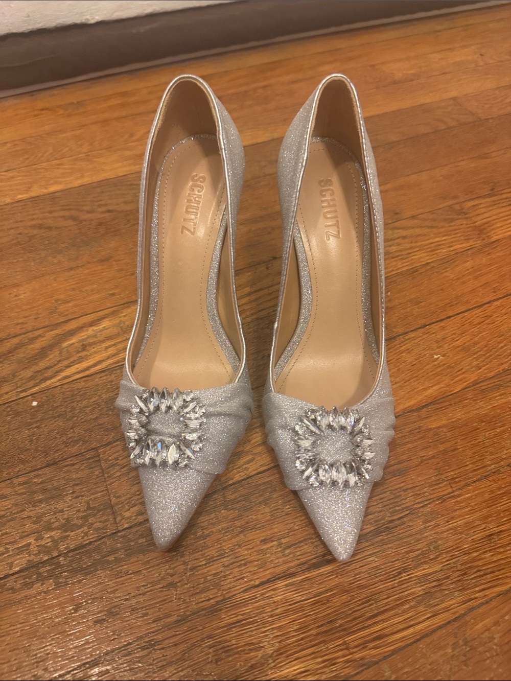 SCHUTZ Silver Glitter Pointed Toe Pumps with Crystal Brooch